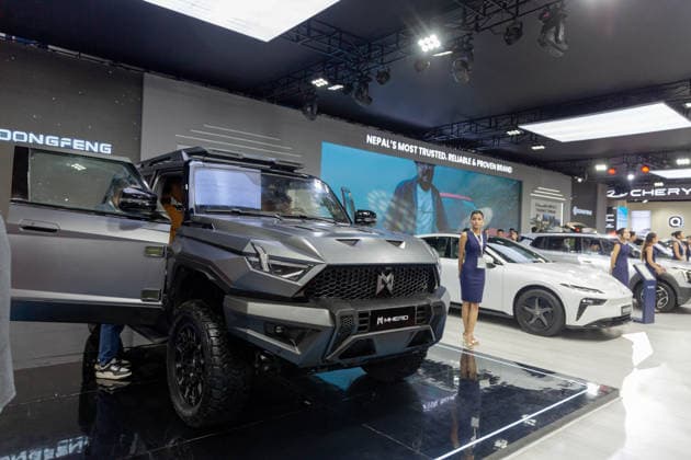 (260826) -- KATHMANDU, Aug. 26, 2026 -- A vehicle is pictured at the booth of Chinese automaker Dongfeng during the 18th NADA Auto Show in Kathmandu, Nepal, Aug. 25, 2026. Nepal s 18th NADA Auto Show kicked off here on Tuesday, bringing together more than 50 vehicle brands. Organized by the NADA Automobiles Association of Nepal, the five-day exhibition features around 200 stalls displaying four-wheelers, two-wheelers, auto parts and related services. (Photo by Xinhua) NEPAL-KATHMANDU-AUTO SHOW SulavxShrestha 