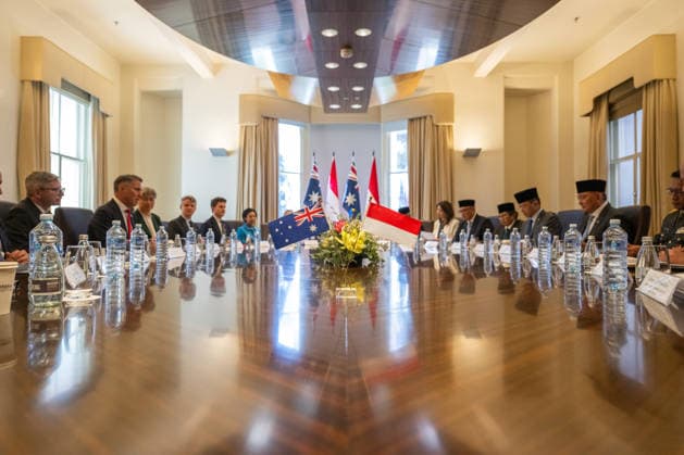 MEETING WITH INDONESIAN MINISTERS, The Australian and Indonesian national flags sit on a table where Federal Defence Minister Marles speaks to Indonesian Defence Minister Sjafrie Sjamsoeddin and Indonesian Foreign Minister Sugiono with Foreign Minister Penny Wong during the 10th Australia - Indonesia Foreign and Defence Ministers™ Meeting at Commonwealth Offices in East Melbourne, Victoria, Australia, Wednesday, August 26, 2026. ( NO ARCHIVING East Melbourne Victoria Australia  Copyright: xJayxKoglerx 20260826142764479605