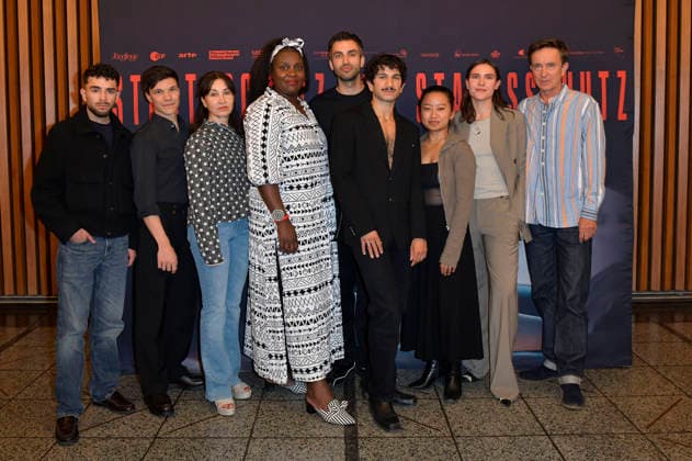 Ali Reza Ahmadi, Sebastian Urzendowsky, Kathrin Angerer, Mercy Dorcas Otieno, Jorgo Narjes, Faraz Shariat, Chen Emilie Yan, Paulina Lorenz und Arnd Klawitter beim Special Screening des Kinofilms Staatsschutz im Kino International. Berlin, 25.08.2026