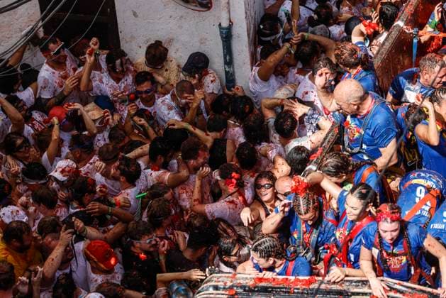 La Tomatina Celebration in Bunol, Valencia, 2026 Several participants in the La Tomatina festival in Bunol throw tomatoes from a truck at the rest of the crowd on August 26, 2026, in Bunol, Valencia, Valencian Community, Spain. La Tomatina is always held on the last Wednesday of August, as part of Bunol’s festival week, and involves participants throwing tomatoes at one another. Seven trucks were needed to transport the 150,000 kilograms of tomatoes thrown in this unique battle, which this year celebrates its 79th anniversary. AUGUST 26, 2026 FESTIVAL TRADITION CULTURE Bunol, Valencia, Valencian Community Bunol, Valencia, Valencian Community, Spain  Copyright: xRoberxSolsonax 7732770
