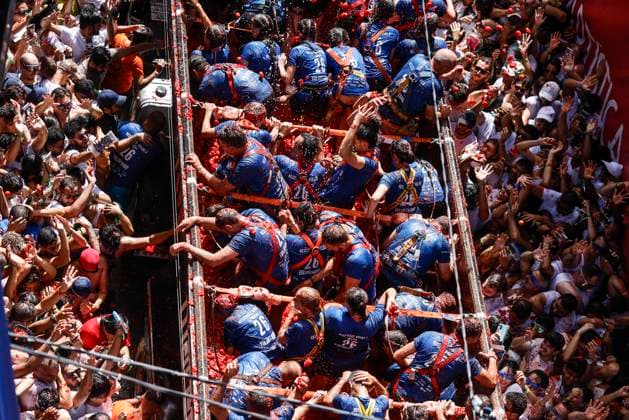 La Tomatina Celebration in Bunol, Valencia, 2026 Several participants in the La Tomatina festival in Bunol throw tomatoes from a truck at the rest of the crowd on August 26, 2026, in Bunol, Valencia, Valencian Community, Spain. La Tomatina is always held on the last Wednesday of August, as part of Bunol’s festival week, and involves participants throwing tomatoes at one another. Seven trucks were needed to transport the 150,000 kilograms of tomatoes thrown in this unique battle, which this year celebrates its 79th anniversary. AUGUST 26, 2026 FESTIVAL TRADITION CULTURE Bunol, Valencia, Valencian Community Bunol, Valencia, Valencian Community, Spain  Copyright: xRoberxSolsonax 7732772