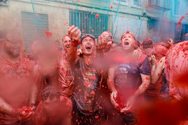 Celebration of La Tomatina in Bunol, Valencia, 2026 Several participants in the La Tomatina festival in Bunol celebrate during the event on August 26, 2026, in Bunol, Valencia, Valencian Community, Spain. La Tomatina is always held on the last Wednesday of August, as part of Bunol’s festival week, and involves participants throwing tomatoes at one another. Seven trucks were needed to transport the 150,000 kilos of tomatoes that were thrown in this unique battle, which this year celebrates its 79th anniversary. AUGUST 26, 2026 FESTIVAL TRADITION CULTURE Bunol, Valencia, Valencian Community Bunol, Valencia, Valencian Community, Spain  Copyright: xRoberxSolsonax 7732788
