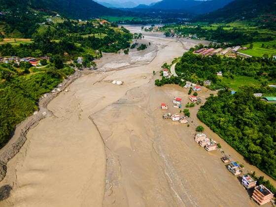 Aerial View Shows Extensive Damage After Flash Flood Sweeps Through The Bhotekoshi River In Nuwakot Aerial view shows flood-damaged areas after a flash flood swept through the Bhotekoshi River in Nuwakot, Nepal, on August 26, 2026. The flooding caused widespread damage to homes, roads, bridges and other infrastructure in the area, while many people remain missing; the figures are still developing Nuwakot bagmati Nepal  Copyright: xAmbirxTolangx originalFilename: tolang-aerialvi260826_npsyL.jpg