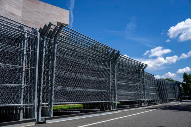 Fencing for the Freedom 250 Grand Prix is stacked as workers dismantle the track around Washington, DC on Wednesday, August 26, 2026. The Freedom 250 Grand Prix took place last weekend gathered thousands around a 1.7 mile course around Washington s landmarks.  WAP20260826311 BONNIExCASH