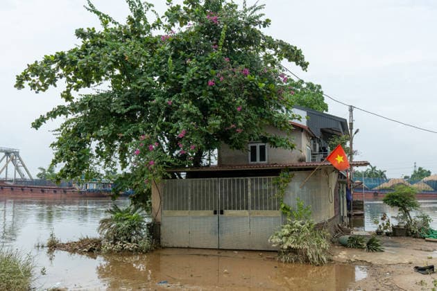 Flooding disrupts life along Vietnam’s riverbanks AN LAC, VIETNAM - AUGUST 26: Floodwaters surround villages along the Cau River after it overflowed following heavy rainfall in An Lac, northern Vietnam on August 26, 2026. Many residents in affected areas have been evacuated as rising water levels inundated homes, roads and agricultural land, leaving some communities partially or completely submerged. Magdalena Chodownik Anadolu An Lac Vietnam. Editorial use only. Please get in touch for any other usage.  Copyright: x2026xAnadoluxMagdalenaxChodownikx