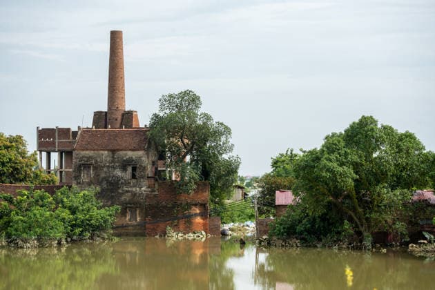 Flooding disrupts life along Vietnam’s riverbanks AN LAC, VIETNAM - AUGUST 26: Floodwaters surround villages along the Cau River after it overflowed following heavy rainfall in An Lac, northern Vietnam on August 26, 2026. Many residents in affected areas have been evacuated as rising water levels inundated homes, roads and agricultural land, leaving some communities partially or completely submerged. Magdalena Chodownik Anadolu An Lac Vietnam. Editorial use only. Please get in touch for any other usage.  Copyright: x2026xAnadoluxMagdalenaxChodownikx