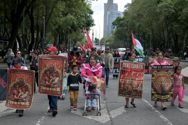 Families march in Mexico City ahead of 12th anniversary of Ayotzinapa disappearances MEXICO CITY, MEXICO AUGUST 26, 2026: Relatives of the 43 missing students from the Ayotzinapa Rural Teachers™ College, joined by students and activists, march from the Angel of Independence toward the Hemiciclo a Benito Juarez in Mexico City on August 26, 2026. The demonstration, held as part of the 143 Accion Global por Ayotzinapa y MÃ xico, took place one month before the 12th anniversary of the disappearance of the 43 students in Guerrero in September 2014. Ciudad de MÃ xico Mexico Copyright: x xAlbertoxRoax xJNAxPressx