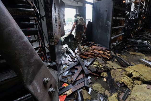 An expert works in an Epicenter hypermarket in the Osnovianskyi district, destroyed by a Russian drone attack, Kharkiv, Ukraine, August 27, 2026. A 40-year-old man was killed, and four others were injured in the strike. (Photo by Viacheslav Madiievskyi Ukrinform) Russian drone attacks home improvement hypermarket in Kharkiv  Copyright: xViacheslavxMadiievskyix