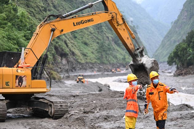 GYIRONG, CHINA - AUGUST 28: Excavators and loaders clear debris on a damaged road section leading to the Gyirong Port on August 28, 2026 in Gyirong, Xizang Autonomous Region of China. A mudslide occurred on the Nepal side on August 26, causing casualties and missing persons at the port; traffic departments have been working to clear approximately 800 meters of the affected G216 highway section as of August 27.  Copyright: xChinaxNewsxServicex 111662595507