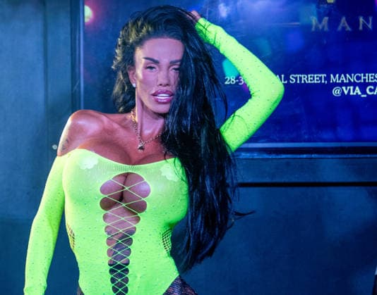 Kate Price at Manchester Village Pride 2026 in Manchester, UK - 28 Aug 2026 Model turned singer, Katie Price commands the stage in a vibrant yellow bodysuit during a provocative performance at Via Manchester on Canal Street for the inaugural Manchester Village Pride 2026. The reality TV icon teased the packed crowd, playing with her hair and striking dramatic poses in the sweltering heat of the venue, pausing occasionally for drags from her vape and sips of her drink. Delivering an interactive set, Price invited excited members of the audience onto the stage to sing along with her, leaving several fans visibly emotional as they shared the microphone with the star. Manchester United Kingdom Copyright: xGaryxRobertsx xSOPAxImagesx GROBERTS-70