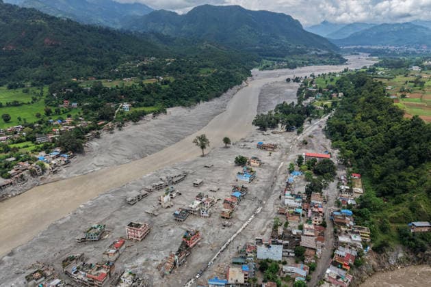 Deaths, missing numbers rise amid aftermath of Nepal-China flash floods DEVIGHAT, NEPAL - AUGUST 29: An aerial photo shows houses at a town along the Trishuli River destroyed by the flash floods, amid increasing deaths and missing people, in Devighat, Nuwakot, Nepal, on August 29, 2026. More than 2,000 people remain missing while hundreds of people have died, following the flash flood and landslide near the Nepal-China border earlier. Among the missing foreign nationals include those from China, India, the United States, Australia, the United Kingdom and South Korea. Daniel Ceng Anadolu Devighat Nepal. Editorial use only. Please get in touch for any other usage.  Copyright: x2026xAnadoluxDanielxCengx