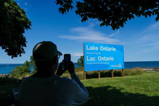 August 29, 2026, Grimsby, On, Canada: A person takes a picture of the newly unveiled sign for Lake Ontario at Fifty Point Conservation Area in Grimsby, Ont., on Saturday, Aug. 29, 2026. Grimsby Canada  - ZUMAc35_ 20260829_zaf_c35_037 Copyright: xKeitoxNewmanx