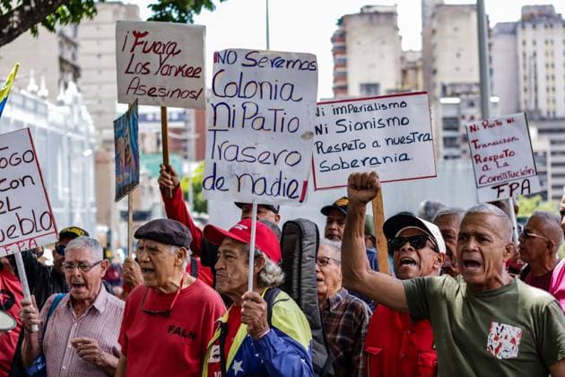 Protesters in Caracas demand transparency over oil agreement with United States CARACAS, VENEZUELA, AUGUST 29, 2026: Protesters affiliated with Chavista groups and social movements of the Anti-Imperialist Popular Front (F.P.A.) march through the La Hoyada area of Caracas to oppose the terms of an oil agreement with the United States and demand that its details be made public and submitted to popular consultation. Demonstrators carried copies of Venezuela™s 1999 Constitution and called for the defense of national sovereignty, while also protesting what they described as the removal of images and symbols associated with former President Hugo Chavez and Simon Bolivar from official premises. Caracas Venezuela (Bolivarian Republic of) Copyright: x xMarioxFloresx xJNAxPressx