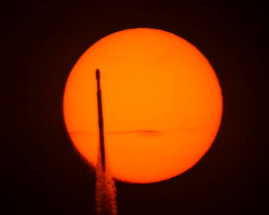 The SpaceX Falcon Heavy rocket transits the sun as it launches the Nancy Grace Roman Space Telescope for NASA at 7:26 AM from Launch Complex 39A at the Kennedy Space Center, Florida on Sunday August 30, 2026.  KSP20260830001 JOExMARINO