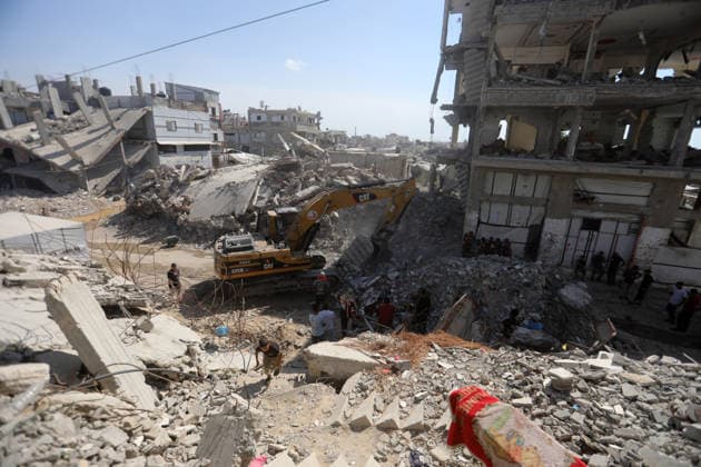 Civil Defense Searches for Missing Under Rubble in Gaza City Members of the Palestinian Civil Defense work with limited resources to search for and recover the bodies of missing people from beneath the rubble of a house belonging to the Ballousha and al-Balawi families in the al-Zeitoun neighborhood of Gaza City, Gaza Strip, on August 30, 2026, after the house was destroyed in an Israeli strike during the war. The effort coincides with the International Day of the Disappeared, while an estimated 8,000 Palestinians remain missing under the rubble of homes and destroyed buildings across the Gaza Strip, according to Civil Defense and official human rights bodies. Photo by Bilal Osama apaimages Gaza city Gaza Strip Palestinian Territory 30082 Copyright: xapaimagesxBilalxOsamax xapaimagesx