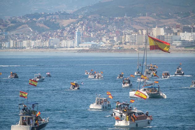 A Solidarity Fleet and a motorcycle rally fill Ceuta Bay with Spanish flags. Numerous people participate in a gathering of boats and motorcycles in support of the people of Ceuta on August 30, 2026, in Ceuta, Spain. Ceuta’s South Bay was filled this Sunday with Spanish and Ceuta flags as a show of support for the people of Ceuta during a day marked by the passage of the so-called Armada of Solidarity. At the same time, a motorcycle rally took place at the Royal Walls, next to the southern bay, where dozens of participants also showed their support for the city. AUGUST 30, 2026 MIGRATION CRISIS RALLY Ceuta Ceuta, Spain  Copyright: xMarcosxMorenox 7738635