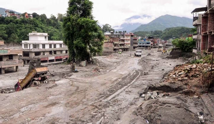 RECORD DATE NOT STATED Flood Leaves Mud-Covered Streets and Overturned Truck in Nuwakot Nuwakot Nepal , Aug 30 (ANI): A mud-covered street lined with buildings shows the aftermath of a devastating flood, with an overturned truck and ongoing debris clearance efforts visible in the area at Trishuli, in Nuwakot on Sunday. (ANI Video Grab) Nuwakot Nepal Copyright: xANIx ANI_20260830159
