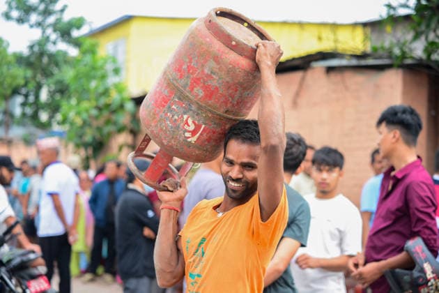 August 31, 2026, Kathmandu, Bagmati, Nepal: Customers wait in long queues to receive liquefied petroleum gas (LPG) cylinders in Kathmandu, Nepal, on August 31, 2026, as the devastating Rasuwa floods add further pressure to an already strained cooking gas distribution system. Nepal had already been facing long queues and difficulties obtaining LPG, with increased demand and distribution problems affecting consumers. The catastrophic flash floods that struck near the Nepal-China border on August 26 swept away homes, vehicles, roads, bridges and other infrastructure, while LPG cylinders were also carried away by the powerful floodwaters. Some people were seen entering the floodwaters and swimming to retrieve the cylinders. The disaster disrupt - ZUMAs330 20260831_zsp_s330_001 Copyright: xSafalxPrakashxShresthax