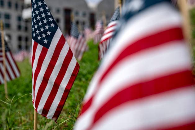 American flags are displayed outside the Department of Labor headquarters ahead of Labor Day in Washington, DC on Monday, August 31, 2026.  WAP20260831354 BONNIExCASH