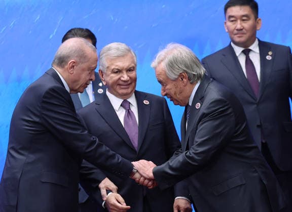 Council of Heads of State of the Shanghai Cooperation Organization in Bishkek BISHKEK, KYRGYZSTAN - SEPTEMBER 01: (----EDITORIAL USE ONLY - MANDATORY CREDIT - TURKISH PRESIDENCY MURAT CETINMUHURDAR HANDOUT - NO MARKETING NO ADVERTISING CAMPAIGNS - DISTRIBUTED AS A SERVICE TO CLIENTS----) Turkish President Recep Tayyip Erdogan speaks with Uzbek President Shavkat Mirziyoyev and United Nations (UN) Secretary-General Antonio Guterres during a family photo session at the Shanghai Cooperation Organization (SCO) Council of Heads of State Meeting in Bishkek, Kyrgyzstan, on September 01, 2026. TUR Presidency Murat Cetinmuhurdar Handout Anadolu Bishkek Kyrgyzstan. Editorial use only. Please get in touch for any other usage.  Copyright: x2026xAnadoluxTURxPresidency MuratxCetinmuhurdar Handoutx