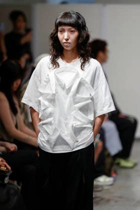September 1, 2026, Tokyo, Japan: A model walks the runway presenting designer Mitsuru Okazaki s Spring Summer 2027 collection during Rakuten Fashion Week TOKYO. The fashion week runs from August 31 to September 5. Tokyo Japan  - ZUMAm191 20260901_aap_m191_093 Copyright: xRodrigoxReyesxMarinx