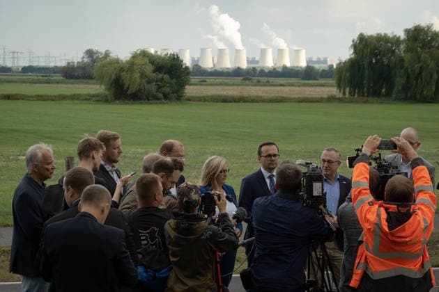 September 1, 2026, Turnow Preilack, Germany: Brandenburg officials speak to the media near the site where improvised rockets reportedly struck a power substation. A power plant is seen in the background. Authorities are investigating the incident. Brandenburgs economy minister Martina Klement and Interior Minister Dr. Jan Redmann Turnow Preilack Germany  - ZUMAs319 20260901_znp_s319_023 Copyright: xGabyxSchuetzex
