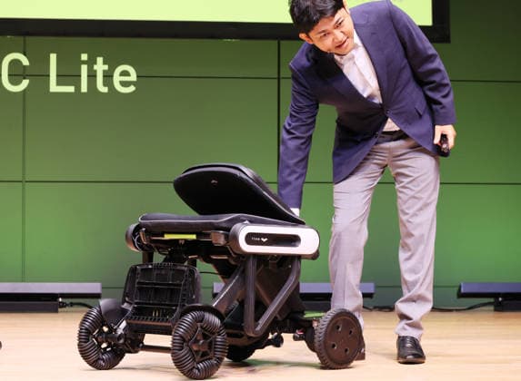 September 3, 2026, Tokyo, Japan - Japanese personal mobility company Whill unveils the new lighweight folding electric wheelchair Whill Model C Lite in Tokyo on Thursday, September 3, 2026. The new mobility weighing 18.6kg body with carbon fiver reinforced plastics parts has omni-directional wheels for front wheels and high performance battery to drive 38.5km of distance. (photo by Yoshio Tsunoda AFLO)  aflo_344739872