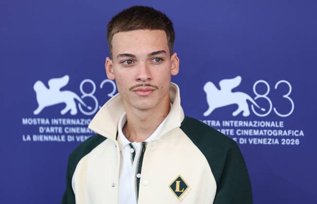 (260904) -- VENICE, Sept. 4, 2026 -- French actor Kenji Peyran of the film 15 18 (A Place To Heal) poses for the photocall during the 83rd Venice International Film Festival in Venice, Italy, Sept. 4, 2026. ) ITALY-VENICE-FILM FESTIVAL-15 18-PHOTOCALL WangxKaiyan 