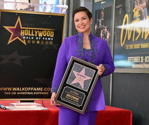 Filipina actress and singer Lea Salonga holds a replica plaque as she stands on her star during an unveiling ceremony honoring her with the 2,855th star on the Hollywood Walk of Fame in Los Angeles on Friday, September 4, 2026.  LAP2026090406 JIMxRUYMEN