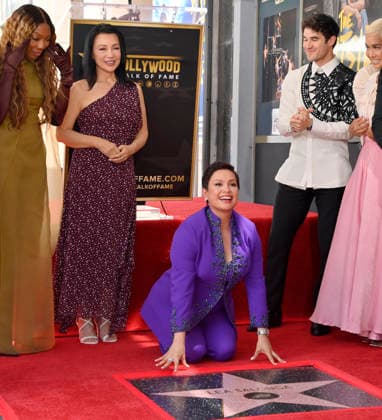 Filipina actress and singer Lea Salonga kneels next to her star during an unveiling ceremony honoring her with the 2,855th star on the Hollywood Walk of Fame in Los Angeles on Friday, September 4, 2026.  LAP2026090422 JIMxRUYMEN
