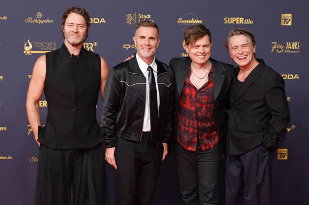 Howard Donald, Gary Barlow und Mark Owen von Take That und Michael Patrick Kelly bei der 32. Verleihung der Goldenen Henne 2026 in der Leipziger Messe. Leipzig, 04.09.2026