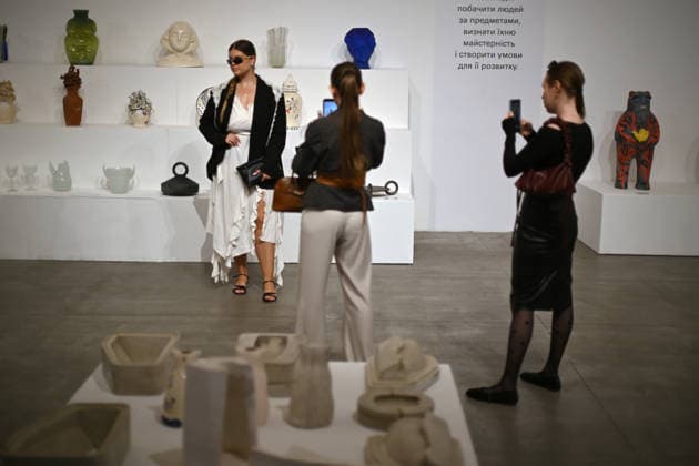 A woman poses at the spatial exhibition Behind the Craft, dedicated to Ukrainian crafts and their reinterpretation by contemporary designers, during Ukrainian Fashion Week SS27 at the Mystetskyi Arsenal National Cultural, Art and Museum Complex, Kyiv, Ukraine, September 5, 2026.(Photo by Yevhen Kotenko Ukrinform) Guests visit Ukrainian Fashion Week SS27 in Kyiv  Copyright: xYevhenxKotenkox