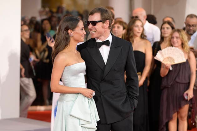 The echo chamber red carpet in Venice Lido - 06 Sep 2026 Michael Fassbender (l) and Alicia Vikander (r) attend the red carpet of movie The echo chamber during the 83rd Venice Film Festival at Palazzo del cinema. Venice Lido Italy Copyright: xMarioxCartellix xSOPAxImagesx _DSC9670