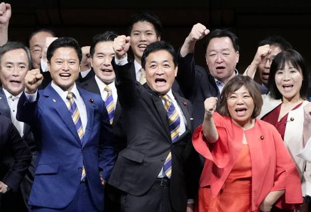 Japan s opposition party incumbent head Tamaki re-elected Yuichiro Tamaki (front, C) pumps his fist in Tokyo after securing a third term as leader of Japan s opposition Democratic Party for the People in its leadership election on Sept. 6, 2026.  A14AA0005627156P