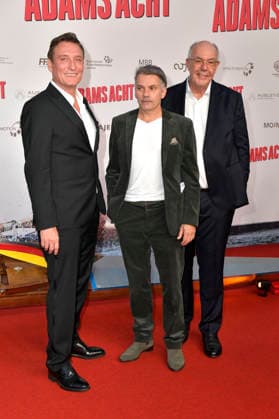 Oliver Masucci, Ivo-Alexander Beck und Gast bei der Premiere des Kinofilms Adams Acht im Zoo Palast. Berlin, 08.09.2026