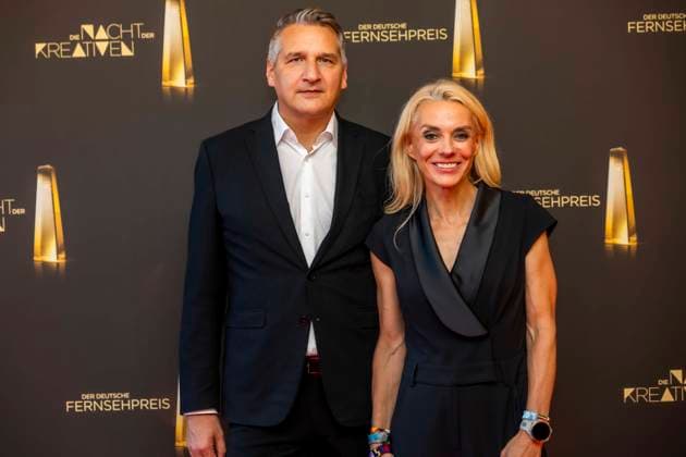 ABB KREATIVE - Inga Leschek (Chief Content Officer RTL) maenliche Begleitung zu Gast auf dem roten Teppich bei der Gala Die Nacht der Kreativen Der Deutsche Fernsehpreis 2026 in der Flora am 08.09.2026 in Koeln NRW Deutschland