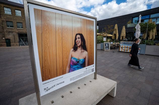 September 9, 2026, London, United Kingdom: A portrait of Amy Winehouse taken in 2004 by photographer Jake Chessum seen displayed as part of the ˜Amy Winehouse. Visitors view ˜Amy Winehouse: In Focus™, a free outdoor photography exhibition at Granary Square and King™s Boulevard in King™s Cross, London. The exhibition features defining and previously unseen photographs of the late singer, offering an intimate portrait of her life and career and marking 20 years since the release of her acclaimed album ˜Back to Black™. The exhibition runs from 1 September to 15 October 2026. London United Kingdom - ZUMAs197 20260909_aaa_s197_588 Copyright: xJamesxWilloughbyx