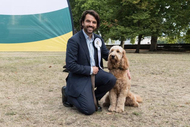 September 10, 2026, London, England, United Kingdom: Bobby Dean MP and his canine companion goldendoodle Chester take part in the Westminster Dog of the Year competition in the Victoria Tower Gardens. The event is a celebration of the unique bond between dogs and their owners, and gives parliamentarians the opportunity to highlight the important work that they ve undertaken in Parliament on dog related matters, whilst promoting responsible dog ownership. London United Kingdom  - ZUMAs371 20260910_zip_s371_027 Copyright: xWiktorxSzymanowiczx