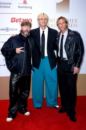 Rea Garvey mit Lucas und Felix Hain von Fast Boybei der Verleihung des 17. Deutschen Radiopreises 2026 im Stage Theater an der Elbe. Hamburg, 10.09.2026