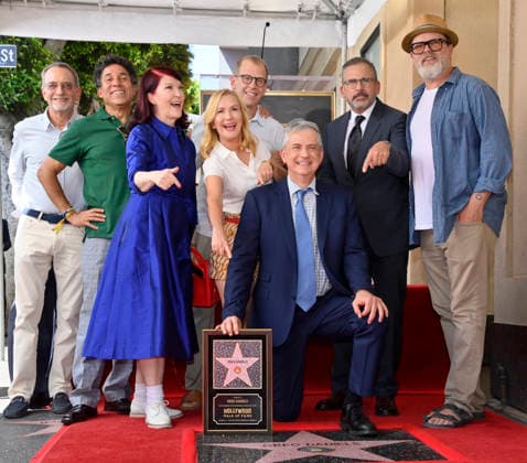 American screenwriter, television producer and director Greg Daniels kneels as he is joined by actors Oscar Nunez, Kate Flannery, Paul Lieberstein, Angela Kinsey, Steve Carell, and Rainn Wilson (L-R) during an unveiling ceremony honoring Daniels with the 2,856th star on the Hollywood Walk of Fame in Los Angeles on Thursday, September 10, 2026.  LAP2026091007 JIMxRUYMEN