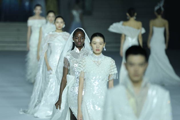 BEIJING, CHINA - SEPTEMBER 10: Models present designs by Liuli and Ziziyu during the closing show of the 2026 China Fashion Week on September 10, 2026 in Beijing, China. The eight-day event featured over 100 fashion releases and activities involving more than 220 brands.  Copyright: xChinaxNewsxServicex 111665687601