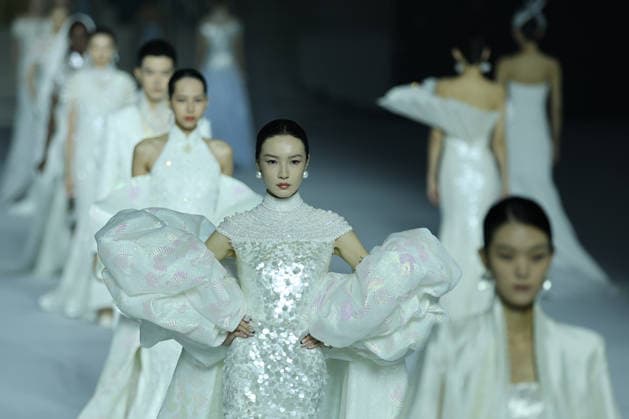 BEIJING, CHINA - SEPTEMBER 10: Models present designs during the closing ceremony of the 2026 China Fashion Week (Autumn) on September 10, 2026 in Beijing, China. The eight-day event featured over 100 fashion releases and activities involving more than 220 brands.  Copyright: xChinaxNewsxServicex 111665687022