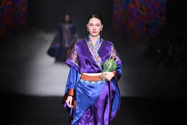 BEIJING, CHINA - SEPTEMBER 10: Models display designs during the Zhu Bingren Jingpai Rongzhuang fashion show at SS2027 Beijing Fashion Week on September 10, 2026 in Beijing, China. The collection features bronze fusion art and a unique color system created by designer Zhu Bingren.  Copyright: xChinaxNewsxServicex 111665695819
