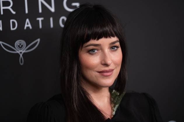 September 10, 2026, New York, New York, United States: Dakota Johnson attends.Celebrities attend the Kering Foundation s Caring For Women Dinner at The Pool on September 10, 2026 in New York City. New York United States  - ZUMAs197 20260910_aaa_s197_847 Copyright: xRonxAdarx