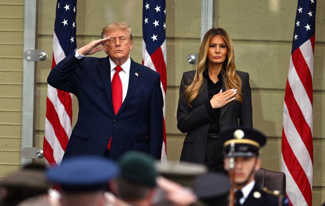 President Donald Trump and first lady Melania Trump stand for the national anthem at the Pentagon to mark 25 years since the 9 11 terrorist attacks on the Pentagon in Arlington, Virginia on Friday, September 11, 2026.  ARL20260911155 ANNABELLExGORDON