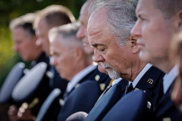 September 11, 2026, Winnipeg, Mb, Canada: Firefighters take a moment of silence as people participate in the 25th Annual 9 11 Memorial Service at the International Peace Garden in Boissevain, Man., Friday, Sept. 11, 2026. Winnipeg Canada  - ZUMAc35_ 20260911_zaf_c35_112 Copyright: xJohnxWoodsx