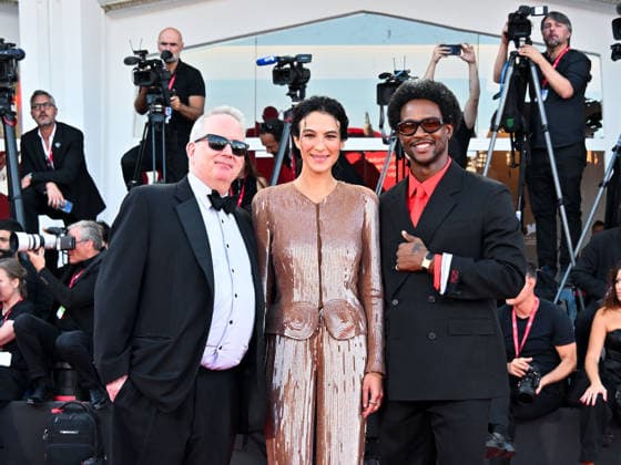 IPA88445916 - Venice, 83rd Venice International Film Festival 2026 - Night 11 - Closing Ceremony Red Carpet. Pictured: Ted Hope, Carolina Cavalli, Akinola Davies Jr.  Copyright: xManuelexMangiarottix xPoolxPhotoxEventsx08x IPA88445916