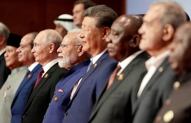 18th BRICS Leaders Summit in India NEW DELHI, INDIA - SEPTEMBER 13: (----EDITORIAL USE ONLY - MANDATORY CREDIT - PRESS INFORMATION BUREAU (PIB) HANDOUT - NO MARKETING NO ADVERTISING CAMPAIGNS - DISTRIBUTED AS A SERVICE TO CLIENTS----) Indian Prime Minister Narendra Modi poses with leaders of BRICS Member Partner Countries Outreach Invitees and Heads of International Organizations for a family photo at the 18th BRICS Summit, in Bharat Mandapam, New Delhi on September 13, 2026. Press Information Bureau (PIB) Anadolu New Delhi India. Editorial use only. Please get in touch for any other usage.  Copyright: x2026xAnadoluxPressxInformationxBureaux(PIB)x
