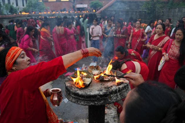 Women Perform Rituals at Pashupatinath on Teej - Kathmandu Hindu women gather at Pashupatinath Temple to offer prayers and perform religious rituals dedicated to Lord Shiva during Haritalika Teej in Kathmandu, Nepal, on September 14, 2026. Many women observe a fast and wear traditional red attire as they celebrate the festival. Photo by Sunii Pradhan ABACAPRESS.COM Nepal  Copyright: xSuniixPradhan ABACAx