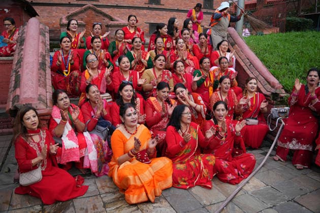 Women Perform Rituals at Pashupatinath on Teej - Kathmandu Hindu women gather at Pashupatinath Temple to offer prayers and perform religious rituals dedicated to Lord Shiva during Haritalika Teej in Kathmandu, Nepal, on September 14, 2026. Many women observe a fast and wear traditional red attire as they celebrate the festival. Photo by Sunii Pradhan ABACAPRESS.COM Nepal  Copyright: xSuniixPradhan ABACAx